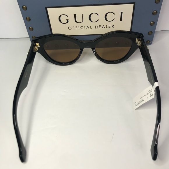 ? Authentic GUCCI GG0957S 003 cat eye Gucci sunglass black frame brown lenses.